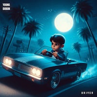 a boy driving a car at night