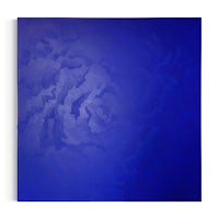 a blue painting on a white background