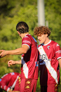 a group of soccer players on a field