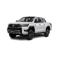 the white 2019 toyota hilux on a black background