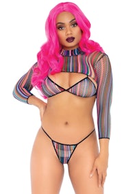 a black woman with pink hair in a striped lingerie set