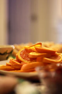 a plate of orange slices on a table