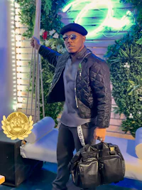 a man in a black jacket holding a bag
