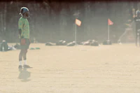 a group of people playing a game of frisbee