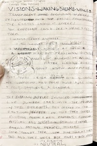 an open notebook with writing on it