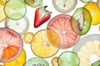 many slices of fruit are shown on a white background