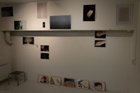 a room with a lot of pictures on the wall