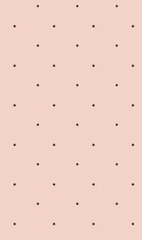 a pink background with dots on it