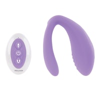 a purple vibrating toy with a remote control