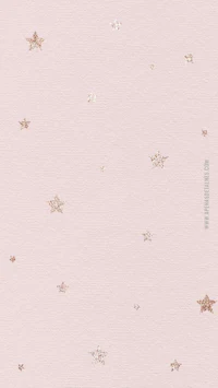 a pink wallpaper with gold stars on it
