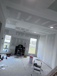 a room that is being remodeled with white walls