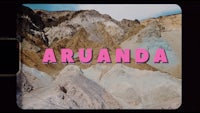 a photo of a mountain with the word aranda written on it