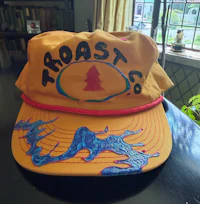 a hat with the words toast co on it
