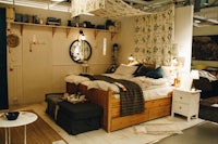 a bedroom with a bed and a bedside table
