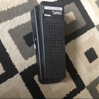 a small black box sitting on top of a rug