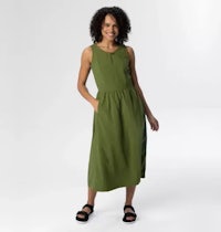 a woman wearing a green midi dress