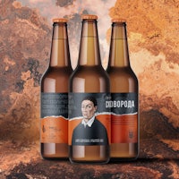 three bottles of beer with an image of a man on them