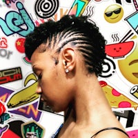 a woman with a shaved head and stickers on her hair