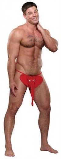 a man in a red thong posing for a picture