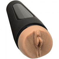 a black plastic sex toy with a hole in it