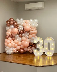 a balloon wall with a number 30 on it