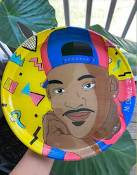 a plate with a picture of a black man on it