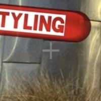 a sign with the word styling on it