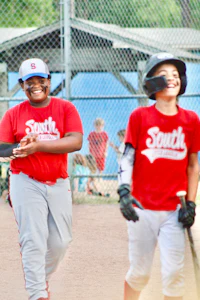 a group of boys playing baseball