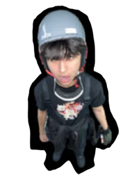 a young man wearing a helmet and a shirt