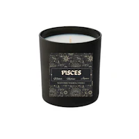 a black candle with the words pisces on it
