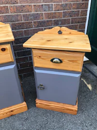 two painted wooden nightstands with drawers