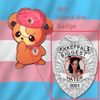a badge with an image of a teddy bear