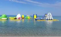 a group of water slides in the water