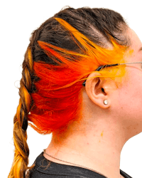 a woman with orange and yellow hair