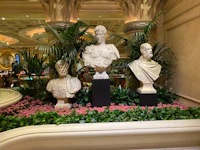 three busts in the lobby of the venetian las vegas