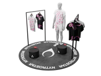 a mannequin wearing pink t - shirts on a stand