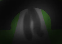 a shadow of a person walking through a tunnel