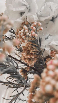 a close up of flowers in a vase