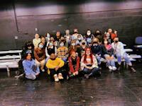 a group of people posing for a photo