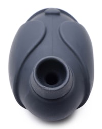 a black teapot with a hole in it