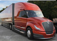 a semi truck is parked in a parking lot