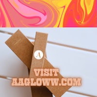 a pink and orange box with the words visit aglow com