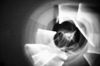 a black and white photo of a circular object