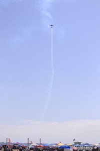 a plane is flying in the sky