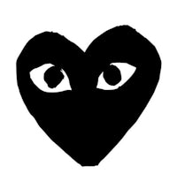 a black heart with two eyes on it