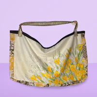 a tote bag with yellow flowers on it