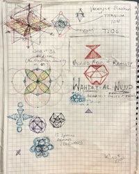 a notebook with drawings of various geometric shapes