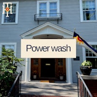 a house with the words power wash on the front door