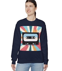 a woman wearing a sweatshirt with a cassette tape on it