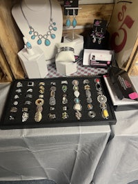 a box full of jewelry on a table